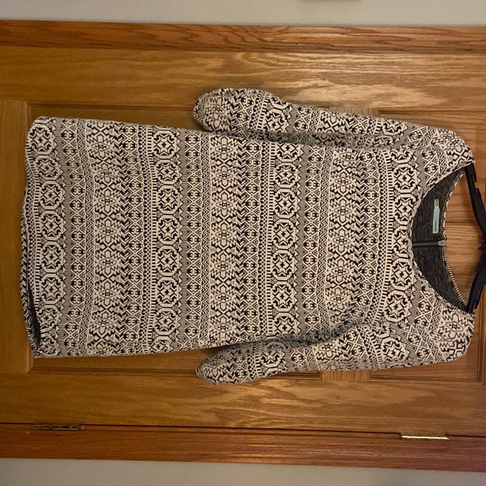 Above the knee black and white knit dress